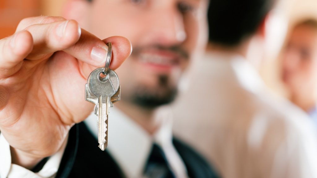 A person holding keys